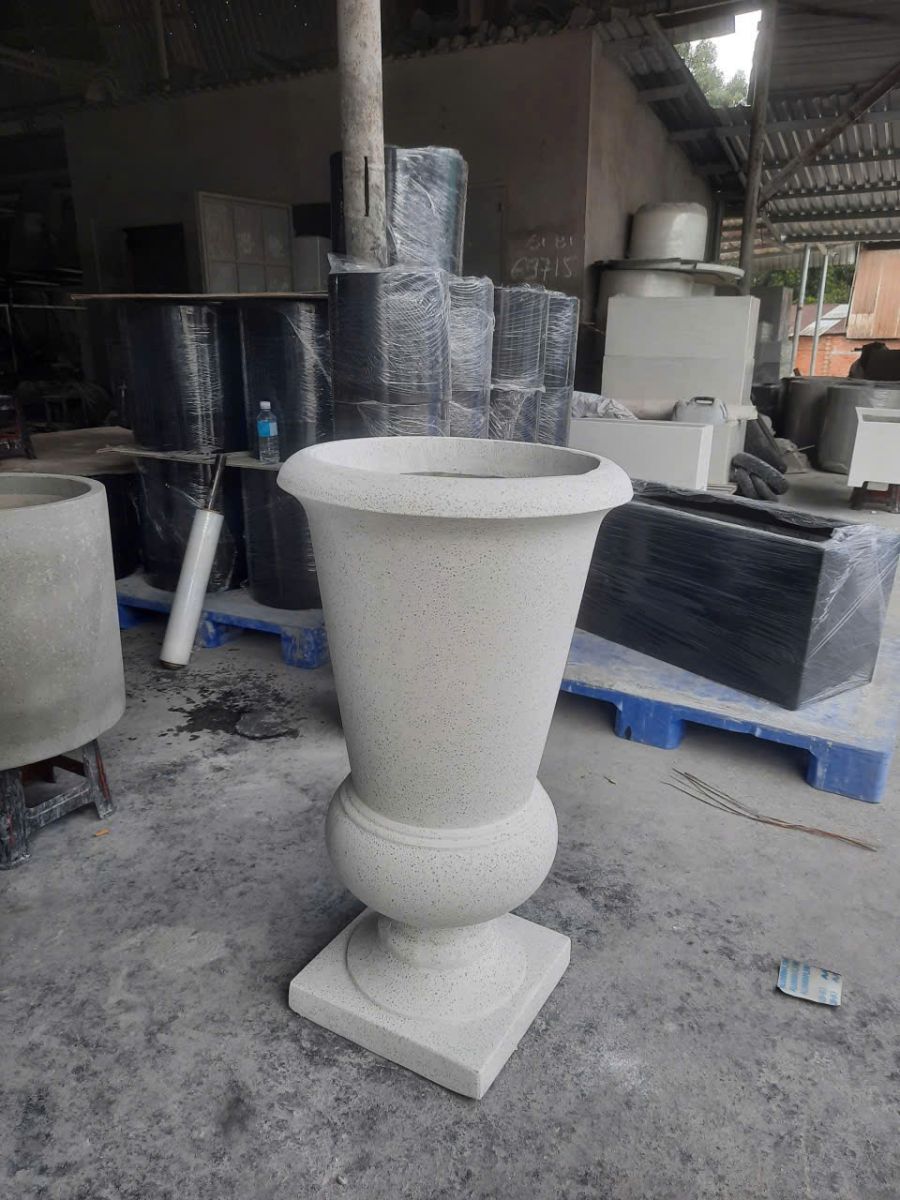 chậu xi măng đá mài theo yêu cầu 